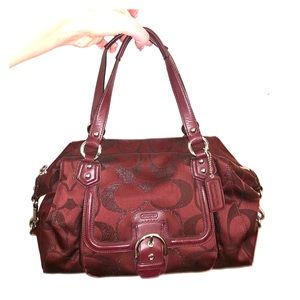 Wine colored Coach purse with front pocket